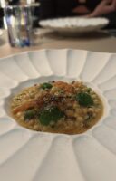 Fregola con crema di melanzana affumicata, totanetti e prescinseua